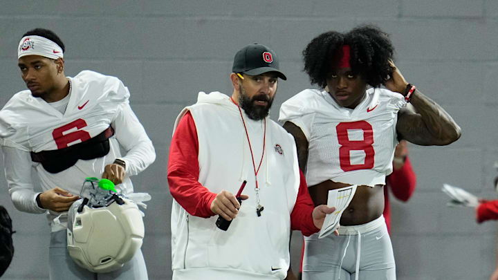 Ohio State Buckeyes defensive coordinator Matt Patricia talks to safety Jaylen McClain (8) during the first day of spring workouts for the 2026 football season at Woody Hayes Athletic Complex in Columbus on March 10, 2026.