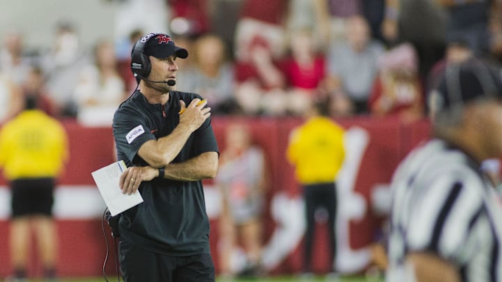 Aug 31, 2024; Tuscaloosa, Alabama, USA; Western Kentucky Hilltoppers head coach Tyson Helton watches the game from the sideline during the fourth quarter at Bryant-Denny Stadium. Mandatory Credit: Will McLelland-Imagn Images