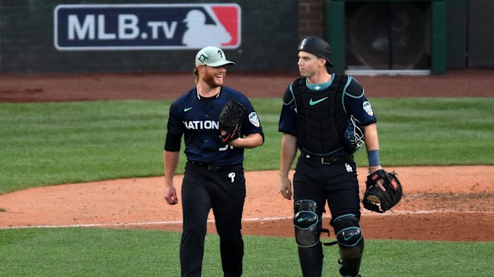National League pitcher Craig Kimbrel of the Philadelphia Phillies (31) reacts with National League catcher  Will Smith  of the Los Angeles Dodgers (16) after the ninth inning at the MLB All-Star Game at T-Mobile Park in Seattle on July 11, 2023.