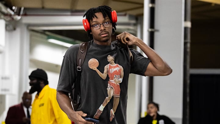 Mar 29, 2026; New Orleans, Louisiana, USA; Houston Rockets forward Isaiah Crawford (27) arrives at the arena before the game against the New Orleans Pelicans at Smoothie King Center. Mandatory Credit: Stephen Lew-Imagn Images