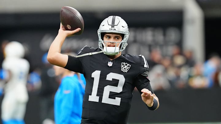 Jan 5, 2025; Paradise, Nevada, USA; Las Vegas Raiders quarterback Aidan O'Connell (12) warms up before a game against the Los Angeles Chargers at Allegiant Stadium. Mandatory Credit: Stephen R. Sylvanie-Imagn Images Jan 5, 2025; Paradise, Nevada, USA; Las Vegas Raiders quarterback Aidan O'Connell (12) warms up before a game against the Los Angeles Chargers at Allegiant Stadium. Mandatory Credit: Stephen R. Sylvanie-Imagn Images