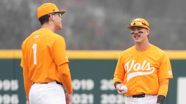 Tennessee outfielder Hunter Ensley (9) chats with Tennessee infielder Dean Curley in the outfield at a Tennessee baseball game against Samford, in Lindsey Nelson Stadium at University of Tennessee in Knoxville, Tenn., Saturday, Feb. 22, 2025. Tennessee outfielder Hunter Ensley (9) chats with Tennessee infielder Dean Curley in the outfield at a Tennessee baseball game against Samford, in Lindsey Nelson Stadium at University of Tennessee in Knoxville, Tenn., Saturday, Feb. 22, 2025.