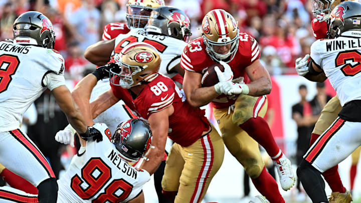 Oct 12, 2025; Tampa, Florida, USA; San Francisco 49ers running back Christian McCaffrey (23) runs for a gain during the third quarter against the Tampa Bay Buccaneers at Raymond James Stadium. Mandatory Credit: Jonathan Dyer-Imagn Images