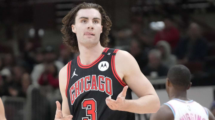 Apr 9, 2025; Chicago, Illinois, USA; Chicago Bulls guard Josh Giddey (3) reacts after making a three point basket against the Miami Heat during the second half at United Center. Mandatory Credit: David Banks-Imagn Images