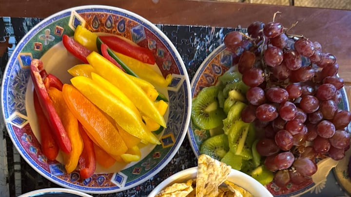 Yes, charcuterie traditionally features meats and cheeses. But use a big table and add some fruits and veggies for color (and nutrition).
