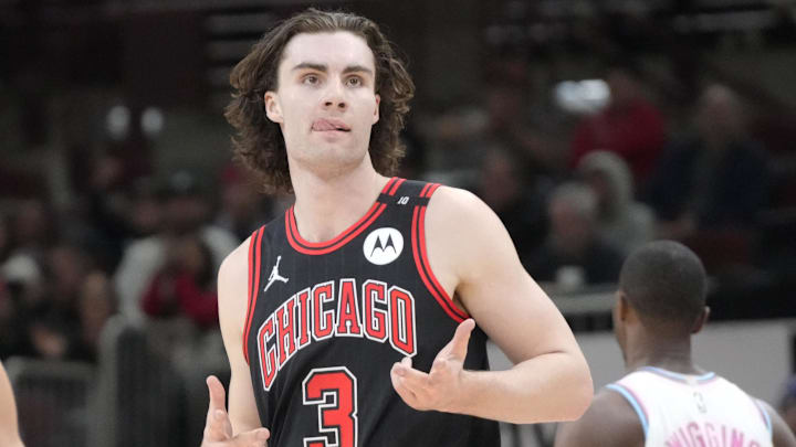 Apr 9, 2025; Chicago, Illinois, USA; Chicago Bulls guard Josh Giddey (3) gestures after making a three point basket against the Miami Heat during the second half at United Center. Mandatory Credit: David Banks-Imagn Images