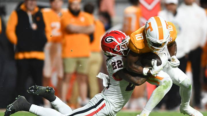 Tennessee wide receiver Squirrel White (10) is tackled by Georgia defensive back Javon Bullard (22) during the NCAA college football game between Tennessee and Georgia on Saturday, November 18, 2023 in Knoxville, Tenn.