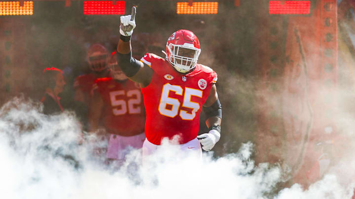 Sep 24, 2023; Kansas City, Missouri, USA; Kansas City Chiefs guard Trey Smith (65) takes the field prior to a game against the Chicago Bears at GEHA Field at Arrowhead Stadium. Mandatory Credit: Jay Biggerstaff-Imagn Images