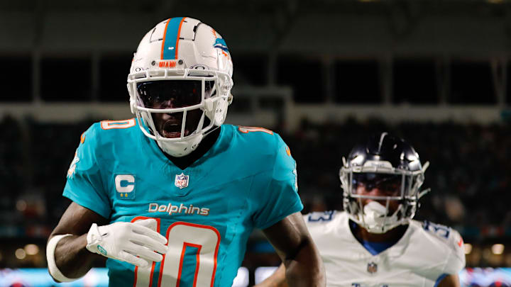 Dec 11, 2023; Miami Gardens, Florida, USA; Miami Dolphins wide receiver Tyreek Hill (10) runs out of