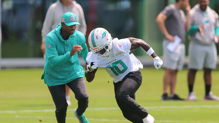 Miami Dolphins wide receiver Tyreek Hill (10) practices during mandatory minicamp at Hard Rock Stadium. Miami Dolphins wide receiver Tyreek Hill (10) practices during mandatory minicamp at Hard Rock Stadium.