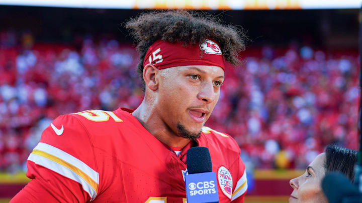 Sep 15, 2024; Kansas City, Missouri, USA; Kansas City Chiefs quarterback Patrick Mahomes (15) is interviewed after the win over the Cincinnati Bengals at GEHA Field at Arrowhead Stadium. Mandatory Credit: Denny Medley-Imagn Images