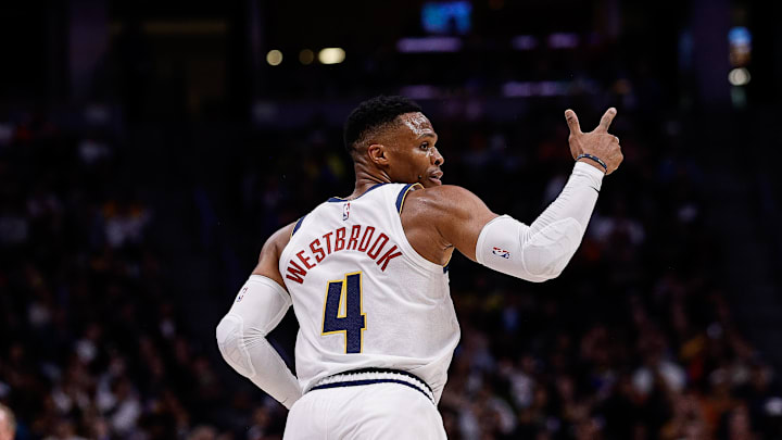 Oct 13, 2024; Denver, Colorado, USA; Denver Nuggets guard Russell Westbrook (4) gestures after a play in the third quarter against the Phoenix Suns at Ball Arena. Mandatory Credit: Isaiah J. Downing-Imagn Images