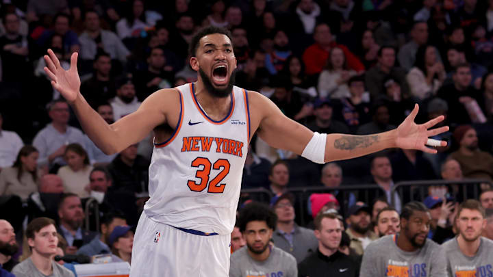 Jan 8, 2025; New York, New York, USA; New York Knicks center Karl-Anthony Towns (32) reacts during the third quarter against the Toronto Raptors at Madison Square Garden. Mandatory Credit: Brad Penner-Imagn Images