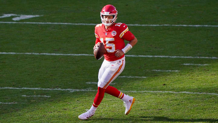 Nov 8, 2020; Kansas City, Missouri, USA; Kansas City Chiefs quarterback Patrick Mahomes (15) rolls out to pass against the Carolina Panthers during the second half at Arrowhead Stadium. Mandatory Credit: Denny Medley-Imagn Images