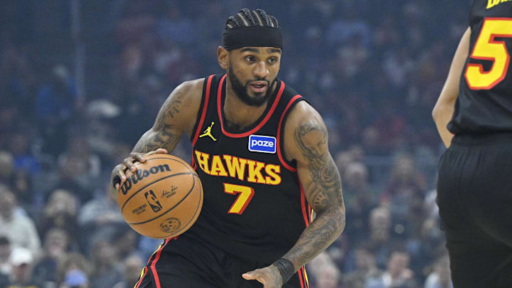 Apr 8, 2026; Cleveland, Ohio, USA; Atlanta Hawks guard Nickeil Alexander-Walker (7) brings the ball up court against the Cleveland Cavaliers in the first quarter at Rocket Arena. Mandatory Credit: David Richard-Imagn Images