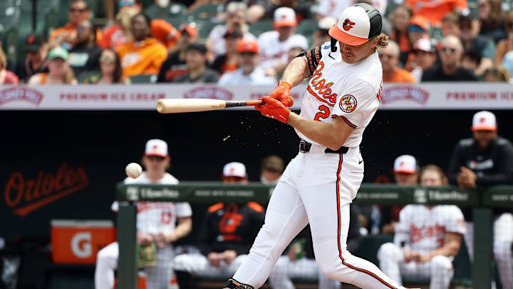 Apr 20, 2025; Baltimore, Maryland, USA; Baltimore Orioles shortstop Gunnar Henderson (2) reaches first base safely on a force out during the first inning against the Cincinnati Reds at Oriole Park at Camden Yards. 