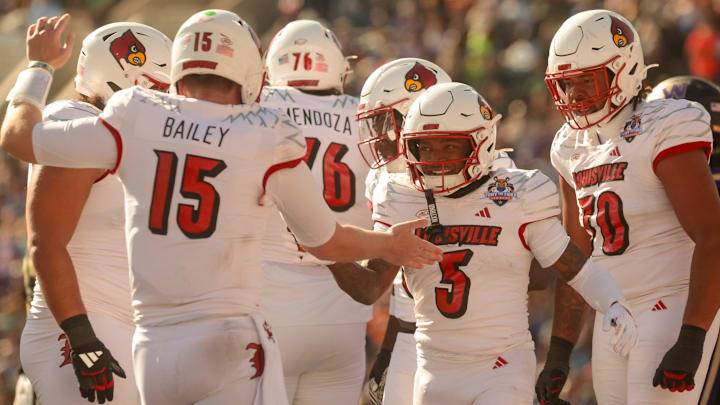 Louisville Caulin Lacy's (5) touchdown is celebrated during the 91st Tony the Tiger Sun Bowl game against Washington on Tuesday, Dec. 31, 2024 at the Sun Bowl Stadium in El Paso, Texas. Louisville Caulin Lacy's (5) touchdown is celebrated during the 91st Tony the Tiger Sun Bowl game against Washington on Tuesday, Dec. 31, 2024 at the Sun Bowl Stadium in El Paso, Texas.