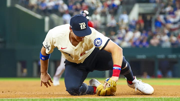 Texas Rangers third baseman Josh Jung (6) fields a ball during the seventh inning against the Boston Red Sox at Globe Life Field in 2025.