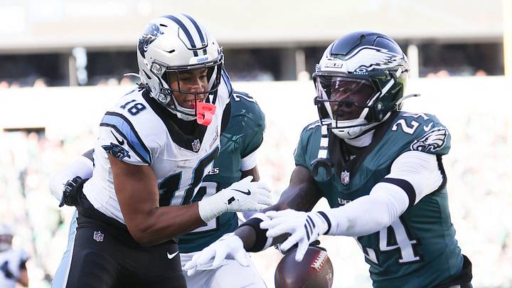 Oct 18, 2026; Philadelphia, Pennsylvania, USA; Philadelphia Eagles safety Andrew Mukuba (24) breaks up a pass to Carolina Panthers wide receiver Jalen Coker (18) during the third quarter at Lincoln Financial Field. Mandatory Credit: Bill Streicher-Imagn Images Oct 18, 2026; Philadelphia, Pennsylvania, USA; Philadelphia Eagles safety Andrew Mukuba (24) breaks up a pass to Carolina Panthers wide receiver Jalen Coker (18) during the third quarter at Lincoln Financial Field. Mandatory Credit: Bill Streicher-Imagn Images
