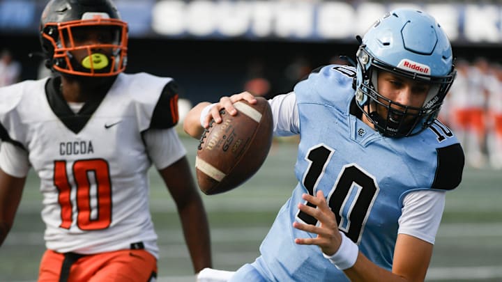 Landon Dougherty of Gadsden County runs the ball during the FHSAA football Class 2A state championship game against Cocoa Thursday, December 12, 2024. Craig Bailey/FLORIDA TODAY via USA TODAY NETWORK Landon Dougherty of Gadsden County runs the ball during the FHSAA football Class 2A state championship game against Cocoa Thursday, December 12, 2024. Craig Bailey/FLORIDA TODAY via USA TODAY NETWORK