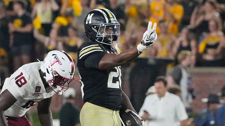 Sep 19, 2026; Columbia, Missouri, USA; Missouri Tigers running back Jamal Roberts (20) celebrates after a run against the Troy Trojans during the second half of the game at Faurot Field at Memorial Stadium. Mandatory Credit: Denny Medley-Imagn Images Sep 19, 2026; Columbia, Missouri, USA; Missouri Tigers running back Jamal Roberts (20) celebrates after a run against the Troy Trojans during the second half of the game at Faurot Field at Memorial Stadium. Mandatory Credit: Denny Medley-Imagn Images