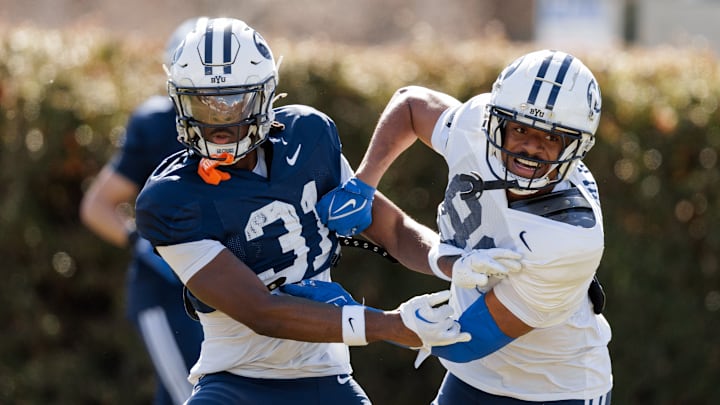 BYU cornerback Kevin Doe and wide receiver Marquis Taliulu at BYU practice BYU cornerback Kevin Doe and wide receiver Marquis Taliulu at BYU practice