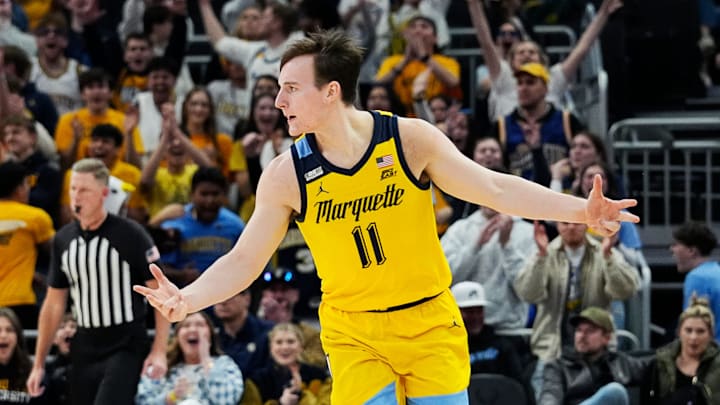 Marquette Golden Eagles guard Tyler Kolek (11) celebrates his three-pointer during the second half