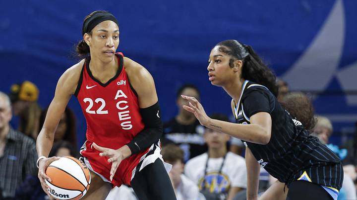 Aug 25, 2024; Chicago, Illinois, USA; Las Vegas Aces center A'ja Wilson (22) is defended by Chicago Sky forward Angel Reese (5) during the first half at Wintrust Arena. Mandatory Credit: Kamil Krzaczynski-Imagn Images Aug 25, 2024; Chicago, Illinois, USA; Las Vegas Aces center A'ja Wilson (22) is defended by Chicago Sky forward Angel Reese (5) during the first half at Wintrust Arena. Mandatory Credit: Kamil Krzaczynski-Imagn Images