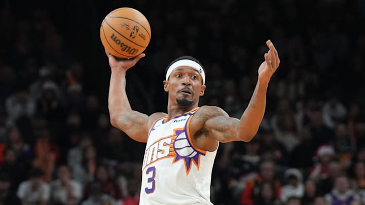 Dec 25, 2024; Phoenix, Arizona, USA; Phoenix Suns guard Bradley Beal (3) controls the ball against the Denver Nuggets during the first half at Footprint Center. Mandatory Credit: Joe Camporeale-Imagn Images