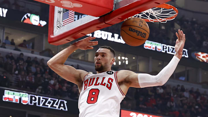 Jan 10, 2025; Chicago, Illinois, USA; Chicago Bulls guard Zach LaVine (8) scores against the Washington Wizards during the first half at United Center. Mandatory Credit: Kamil Krzaczynski-Imagn Images