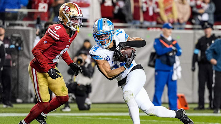 Detroit Lions wide receiver Amon-Ra St. Brown (14) makes a catch for a touchdown against San Francisco 49ers cornerback Renardo Green (0) during the second half at Levi's Stadium in Santa Clara, Calif. on Monday, Dec. 30, 2024. Detroit Lions wide receiver Amon-Ra St. Brown (14) makes a catch for a touchdown against San Francisco 49ers cornerback Renardo Green (0) during the second half at Levi's Stadium in Santa Clara, Calif. on Monday, Dec. 30, 2024.