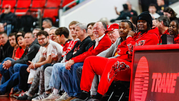 Feb 15, 2025; Raleigh, North Carolina, USA; Former North Carolina State Wolfpack players DJ Burns and DJ Horn take on the game during the first half of the game against Boston College Eagles at Lenovo Center. Mandatory Credit: Jaylynn Nash-Imagn Images Feb 15, 2025; Raleigh, North Carolina, USA; Former North Carolina State Wolfpack players DJ Burns and DJ Horn take on the game during the first half of the game against Boston College Eagles at Lenovo Center. Mandatory Credit: Jaylynn Nash-Imagn Images