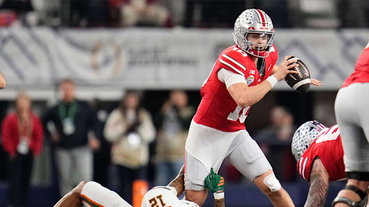 Miami Hurricanes defensive lineman Marquise Lightfoot (12) sacks Ohio State Buckeyes quarterback Julian Sayin (10) during the Cotton Bowl at AT&T Stadium in Arlington, Texas for the College Football Playoff quarterfinal game on Dec. 31, 2025. Ohio State lost 24-14.