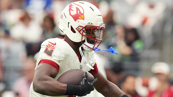 Arizona Cardinals running back Jeremiyah Love (4) warms up before their game against the Seattle Seahawks at State Farm Stadium in Glendale on Sept. 20, 2026.