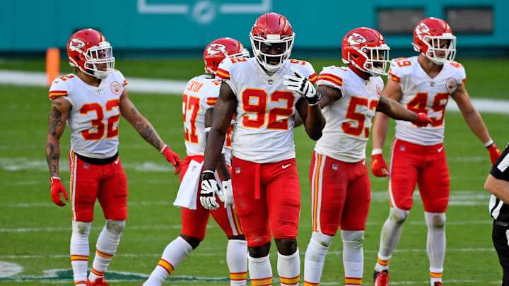 Dec 13, 2020; Miami Gardens, Florida, USA; Kansas City Chiefs defensive end Tanoh Kpassagnon (92) walks up to the line of scrimmages with teammates during the first half against the Miami Dolphins at Hard Rock Stadium. Mandatory Credit: Jasen Vinlove-Imagn Images