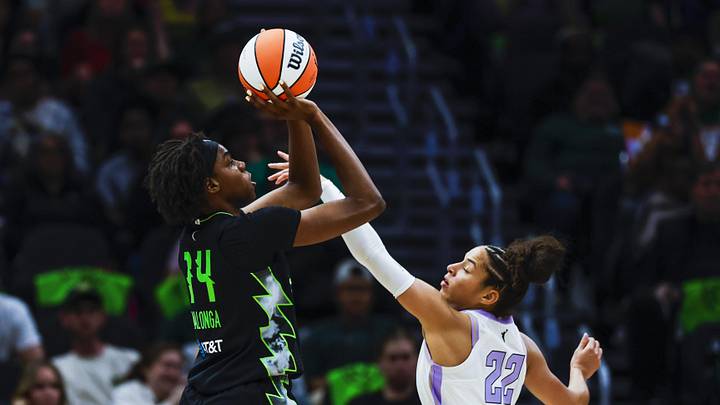May 8, 2026; Seattle, Washington, USA; Seattle Storm center Dominique Malonga (14) shoots against Golden State Valkyries guard Veronica Burton (22) during the second quarter at Climate Pledge Arena. Mandatory Credit: Joe Nicholson-Imagn Images May 8, 2026; Seattle, Washington, USA; Seattle Storm center Dominique Malonga (14) shoots against Golden State Valkyries guard Veronica Burton (22) during the second quarter at Climate Pledge Arena. Mandatory Credit: Joe Nicholson-Imagn Images