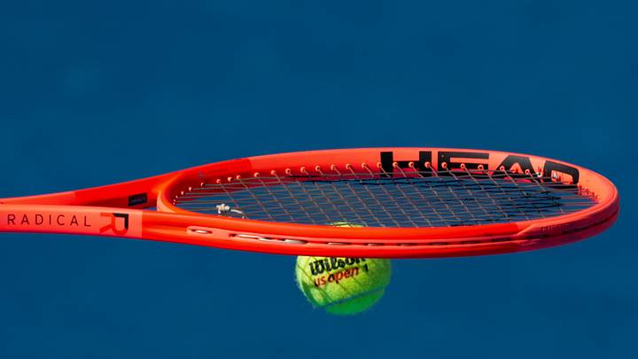 A Wilson match ball is seen against the racket of Flavio Cobolli (ITA) as he prepares to serve against Tommy Paul (USA) during the Cincinnati Open at Lindner Family Tennis Center. Mandatory Credit: Aaron Doster-Imagn Images A Wilson match ball is seen against the racket of Flavio Cobolli (ITA) as he prepares to serve against Tommy Paul (USA) during the Cincinnati Open at Lindner Family Tennis Center. Mandatory Credit: Aaron Doster-Imagn Images