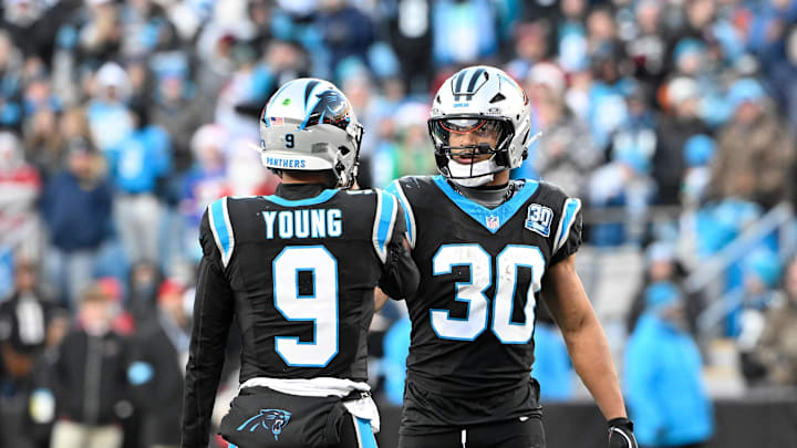 Dec 22, 2024; Charlotte, North Carolina, USA; Carolina Panthers quarterback Bryce Young (9) and running back Chuba Hubbard (30) react in overtime at Bank of America Stadium. Dec 22, 2024; Charlotte, North Carolina, USA; Carolina Panthers quarterback Bryce Young (9) and running back Chuba Hubbard (30) react in overtime at Bank of America Stadium.