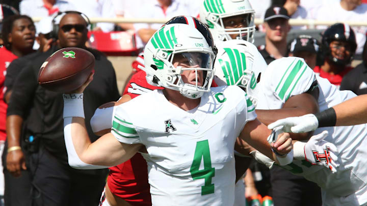Sep 14, 2024; Lubbock, Texas, USA; North Texas Mean Green quarterback Chandler Morris (4) throws the ball against the Texas Tech Red Raiders in the first half at Jones AT&T Stadium and Cody Campbell Field. Mandatory Credit: Michael C. Johnson-Imagn Images Sep 14, 2024; Lubbock, Texas, USA; North Texas Mean Green quarterback Chandler Morris (4) throws the ball against the Texas Tech Red Raiders in the first half at Jones AT&T Stadium and Cody Campbell Field. Mandatory Credit: Michael C. Johnson-Imagn Images