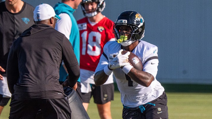 Jacksonville Jaguars running back Travis Etienne Jr. (1) turns it upfield during the Jacksonville Jaguars’ 18th and final training camp practice at Miller Electric Center in Jacksonville, Fla. Wednesday August 20, 2025. Jacksonville Jaguars running back Travis Etienne Jr. (1) turns it upfield during the Jacksonville Jaguars’ 18th and final training camp practice at Miller Electric Center in Jacksonville, Fla. Wednesday August 20, 2025.