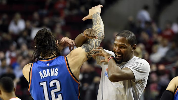 Apr 6, 2016; Portland, OR, USA; Oklahoma City Thunder center Steven Adams (12) goes through a pre-game ritual with Oklahoma City Thunder forward Kevin Durant before the start of the game at the Moda Center at the Rose Quarter. Mandatory Credit: Steve Dykes-Imagn Images