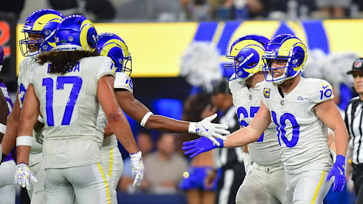 Oct 24, 2024; Inglewood, California, USA; Los Angeles Rams wide receiver Cooper Kupp (10) celebrates his touchdown scored against the Minnesota Vikings with wide receiver Demarcus Robinson (15) during the first half at SoFi Stadium. Mandatory Credit: Gary A. Vasquez-Imagn Images