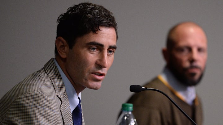 San Diego Padres general manager AJ Preller (left) speaks to the media.