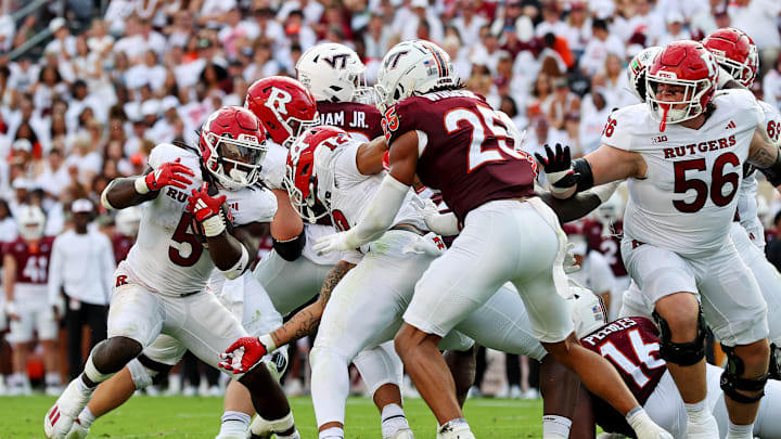 Sep 21, 2024; Blacksburg, Virginia, USA; Rutgers Scarlet Knights running back Kyle Monangai (5) runs the ball during the third quarter against the Virginia Tech Hokies at Lane Stadium. Mandatory Credit: Peter Casey-Imagn Images