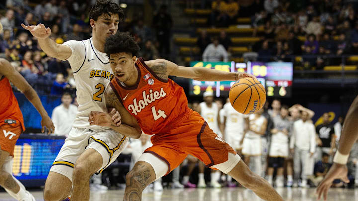Jan 11, 2025; Berkeley, California, USA; Virginia Tech Hokies guard Rodney Brown Jr. (4) dribbles the ball against California Golden Bears guard Andrej Stojakovic (2) during the second half at Haas Pavilion. Mandatory Credit: D. Ross Cameron-Imagn Images Jan 11, 2025; Berkeley, California, USA; Virginia Tech Hokies guard Rodney Brown Jr. (4) dribbles the ball against California Golden Bears guard Andrej Stojakovic (2) during the second half at Haas Pavilion. Mandatory Credit: D. Ross Cameron-Imagn Images