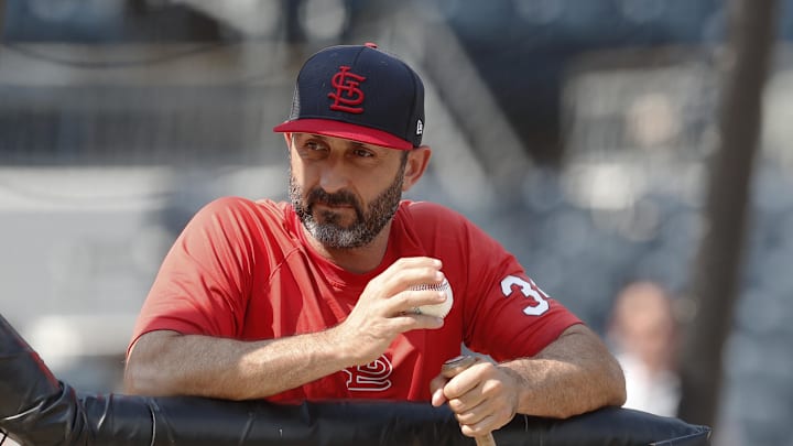 Jul 23, 2024; Pittsburgh, Pennsylvania, USA;  St. Louis Cardinals bench coach Daniel Descalso (34) looks on during batting practice before a game against the Pittsburgh Pirates at PNC Park. Mandatory Credit: Charles LeClaire-Imagn Images
