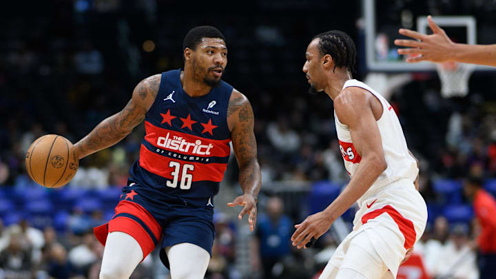 Mar 24, 2025; Washington, District of Columbia, USA; Washington Wizards guard Marcus Smart (36) handles the ball during the second quarter against the Toronto Raptors at Capital One Arena. Mandatory Credit: Reggie Hildred-Imagn Images