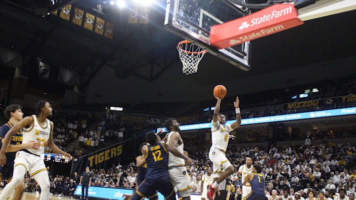 Dec. 3, 2024; Columbia, Missouri, USA; Missouri Tiger guard Anthony Robinson II (2) attempts an uncontested floater against the California Golden Bears at Mizzou Arena.