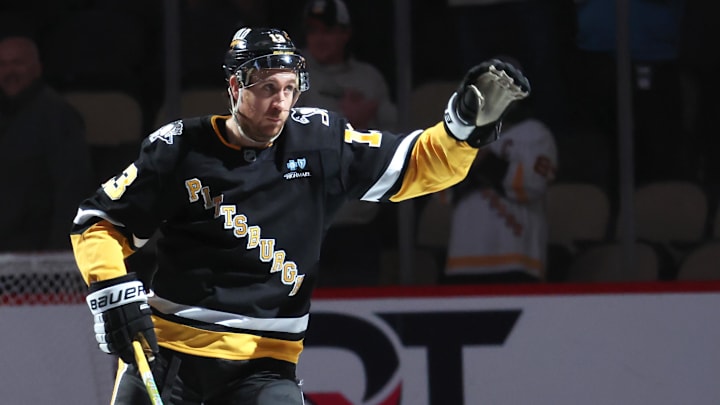 Apr 8, 2025; Pittsburgh, Pennsylvania, USA;  Pittsburgh Penguins right wing Kevin Hayes (13) reacts after being named first star of the game against  the Chicago Blackhawks at PPG Paints Arena. Mandatory Credit: Charles LeClaire-Imagn Images