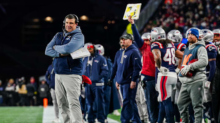 Jan 4, 2026; Foxborough, Massachusetts, USA; New England Patriots head coach Mike Vrabel watches game play against the Miami Dolphins during the second quarter at Gillette Stadium. Mandatory Credit: David Butler II-Imagn Images